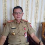 Kadis Kominfo Lambar Luruskan Pemberitaan Isu Larangan Kendaraan Plat Luar Daerah Parkir di Lingkungan Pemda.