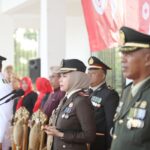 Hut RI Ke81, Kajari Lampung Tengah Rita Susanti Jadi Inspektur Upacara Penurunan Bendera Merah Putih